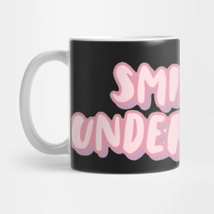 Smiling Underneath Mug